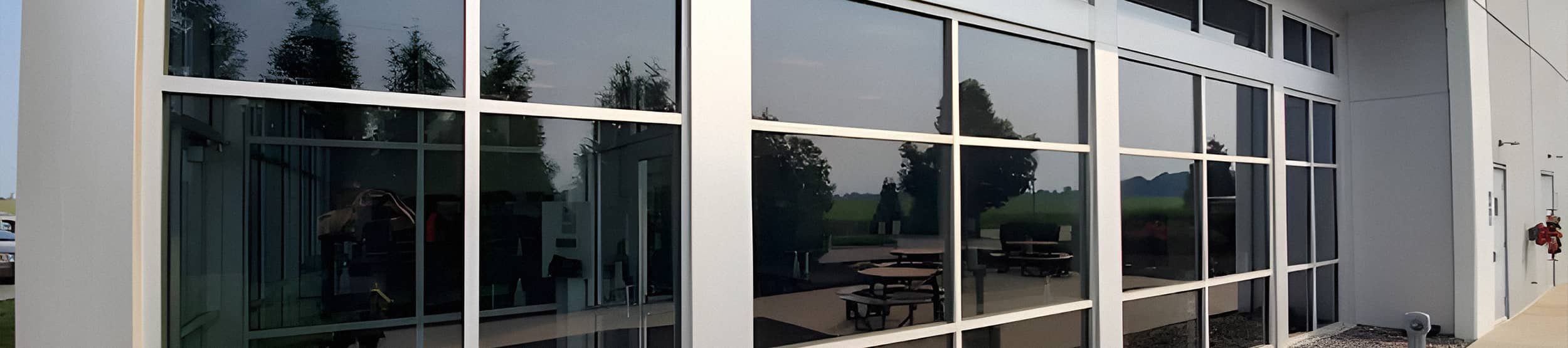 a wall of crystal clear exterior windows